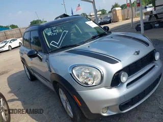 2012 MINI Countryman S z VIN WMWZC5C59CWL63348, wystawiony jako IAAI lot #42317781 z przebiegiem 132 639 mil mil oraz . Historia ofert i sprzedaży dostępna na DreamBid. Obrazek 1.