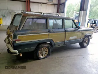 1986 Jeep Grand Wagoneer с VIN 1JCNJ15U5GT147524, выставлен на аукционе Copart как лот 57421255 с пробегом 112 292 миль миль и Списание • Salvage title. История ставок и продаж доступна на DreamBid. Изображение 3.