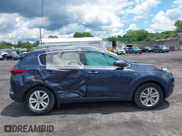 2017 Kia Sportage LX z VIN KNDPMCAC1H7272881, wystawiony jako IAAI lot #38926444 z przebiegiem 12 743 mil mil oraz . Historia ofert i sprzedaży dostępna na DreamBid. Obrazek 12.
