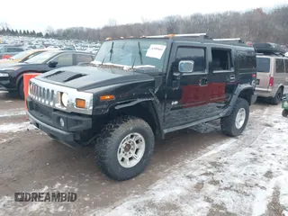 2003 Hummer H2 with VIN 5GRGN23UX3H106356, listed as a IAAI auction lot 41185603 with Not Provided miles. Bid and sale history available at carsss.com. Image 2.