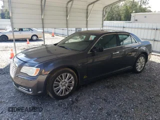 2014 Chrysler 300 C with VIN 2C3CCAKT7EH290150, listed as a Copart auction lot 73772864 with 162,952 mi miles and Salvage Title. Bid and sale history available at carsss.com. Image 1.