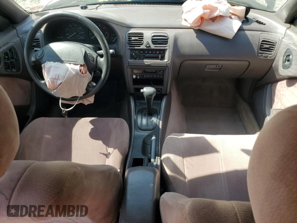1995 Subaru Legacy L with VIN 4S3BK6353S7328522, listed as a Copart auction lot 71933944 with 60,105 mi miles and Salvage title. Bid and sale history available at DreamBid. Image 8.