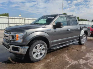 2019 Ford F-150 XL with VIN 1FTEW1E53KFB57102, listed as a Copart auction lot 61633055 with 86,949 mi miles and Salvage title. Bid and sale history available at DreamBid. Image 1.