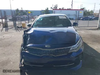 2018 Kia Optima SX with VIN 5XXGV4L29JG208284, listed as a IAAI auction lot 41765005 with 77,189 mi miles. Bid and sale history available at carsss.com. Image 13.