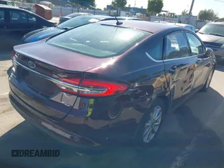 2017 Ford Fusion SE z VIN 3FA6P0H78HR368483, wystawiony jako IAAI lot #42279314 z przebiegiem 68 363 mil mil oraz . Historia ofert i sprzedaży dostępna na DreamBid. Obrazek 4.