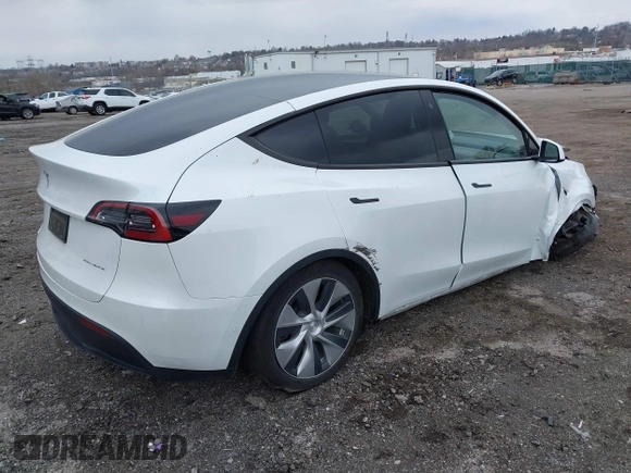 2022 Tesla Model Y Long Range with VIN 7SAYGAEE4NF516625, listed as a IAAI auction lot 41892225 with 33,054 mi miles and . Bid and sale history available at DreamBid. Image 4.