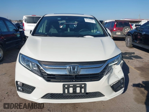 2019 Honda Odyssey EX-L z VIN 5FNRL6H76KB083005, wystawiony jako IAAI lot #41589181 z przebiegiem 27 633 mil mil oraz . Historia ofert i sprzedaży dostępna na DreamBid. Obrazek 12.