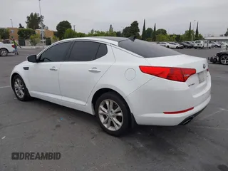 2013 Kia Optima EX z VIN 5XXGN4A75DG099762, wystawiony jako IAAI lot #42443408 z przebiegiem 110 189 mil mil oraz . Historia ofert i sprzedaży dostępna na DreamBid. Obrazek 3.