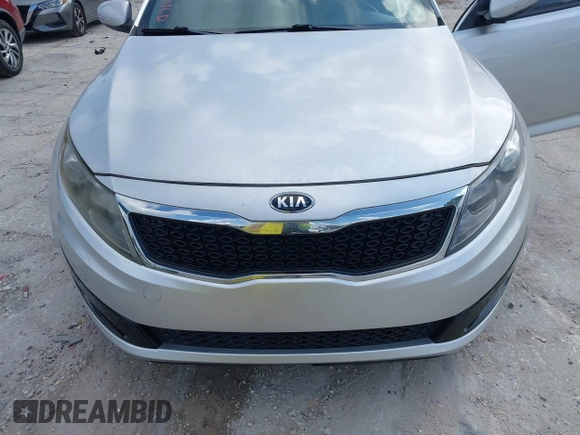 2013 Kia Optima LX with VIN KNAGM4A75D5380478, listed as a IAAI auction lot 42153829 with 82,845 mi miles. Bid and sale history available at carsss.com. Image 6.