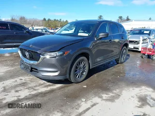 2017 Mazda CX-5 Touring with VIN JM3KFBCL3H0214881, listed as a IAAI auction lot 41694560 with 64,609 mi miles. Bid and sale history available at carsss.com. Image 17.