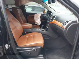 2013 Jeep Grand Cherokee Overland with VIN 1C4RJFCG8DC614542, listed as a IAAI auction lot 41733846 with 44,131 mi miles. Bid and sale history available at carsss.com. Image 5.