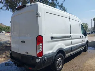 2019 Ford Transit with VIN 1FTYR2CM5KKB19415, listed as a IAAI auction lot 42129144 with 198,457 mi miles and . Bid and sale history available at DreamBid. Image 4.