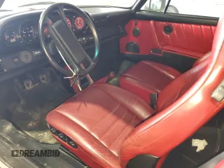 1988 Porsche 911 z VIN WP0EB0913JS161203, wystawiony jako Copart lot #71547754 z przebiegiem 109 128 mil mil oraz Szkoda całkowita • Salvage title. Historia ofert i sprzedaży dostępna na DreamBid. Obrazek 8.
