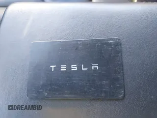2022 Tesla Model 3 Long Range with VIN 5YJ3E1EB0NF212257, listed as a IAAI auction lot 41735989 with 28,528 mi miles and . Bid and sale history available at DreamBid. Image 11.