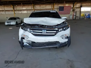 2018 Honda Pilot Touring с VIN 5FNYF6H98JB053524, выставлен на аукционе Copart как лот 61447785 с пробегом 114 942 миль миль и Списание • Salvage title. История ставок и продаж доступна на DreamBid. Изображение 5.