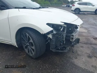 2016 Nissan Maxima SV z VIN 1N4AA6AP2GC401273, wystawiony jako IAAI lot #41898456 z przebiegiem 139 720 mil mil oraz . Historia ofert i sprzedaży dostępna na DreamBid. Obrazek 19.