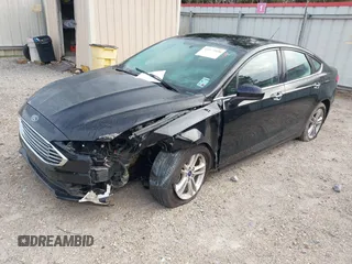 2018 Ford Fusion SE z VIN 3FA6P0H79JR276224, wystawiony jako IAAI lot #41277958 z przebiegiem 99 098 mil mil oraz . Historia ofert i sprzedaży dostępna na DreamBid. Obrazek 17.