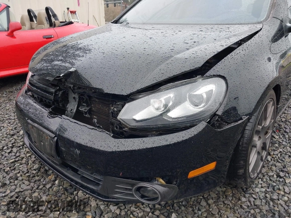 2013 Volkswagen Golf TDI with VIN WVWDM7AJ7DW126462, listed as a IAAI auction lot 41713250 with 116,684 mi miles and . Bid and sale history available at DreamBid. Image 6.