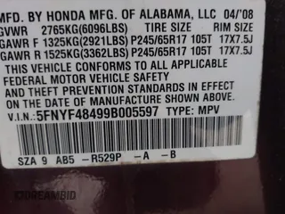 2009 Honda Pilot EX with VIN 5FNYF48499B005597, listed as a IAAI auction lot 41975121 with 309,769 mi miles. Bid and sale history available at carsss.com. Image 9.
