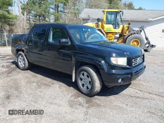 2007 Honda Ridgeline RTL w/Leather with VIN 2HJYK165X7H548322, listed as a IAAI auction lot 41983105 with 152,292 mi miles. Bid and sale history available at carsss.com. Image 1.