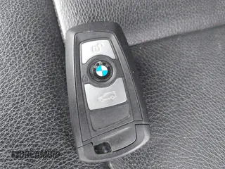 2013 BMW 3 Series 328i xDrive with VIN WBA3B5C5XDF597184, listed as a IAAI auction lot 42060785 with 205,559 mi miles. Bid and sale history available at carsss.com. Image 11.