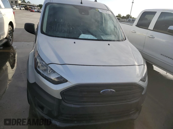 2021 Ford Transit Connect XL z VIN NM0LS6E22M1498123, wystawiony jako Copart lot #74475814 z przebiegiem Nie podano mil oraz Szkoda całkowita • Salvage title. Historia ofert i sprzedaży dostępna na DreamBid. Obrazek 5.