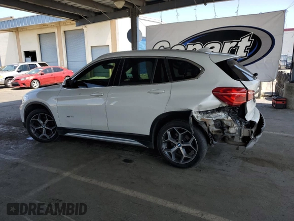 2017 BMW X1 xDrive28i with VIN WBXHT3C35H5F73546, listed as a Copart auction lot 59544545 with 125,185 mi miles and Salvage title. Bid and sale history available at DreamBid. Image 2.
