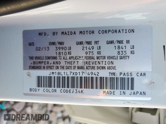 2013 Mazda 3 i Touring z VIN JM1BL1L7XD1794942, wystawiony jako Copart lot #57842295 z przebiegiem 124 408 mil mil oraz Szkoda całkowita • Salvage title. Historia ofert i sprzedaży dostępna na DreamBid. Obrazek 12.