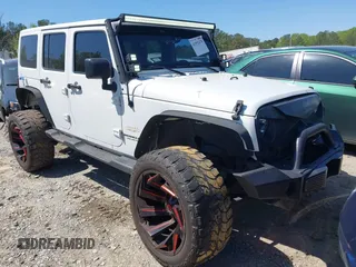 2014 Jeep Wrangler Unlimited Sahara z VIN 1C4HJWEG8EL320679, wystawiony jako IAAI lot #41992470 z przebiegiem 154 196 mil mil oraz . Historia ofert i sprzedaży dostępna na DreamBid. Obrazek 1.