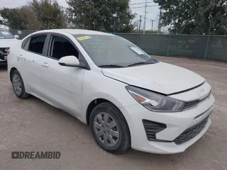 2023 Kia Rio S with VIN 3KPA24AD4PE554165, listed as a IAAI auction lot 41270033 with 27,937 mi miles. Bid and sale history available at carsss.com. Image 1.