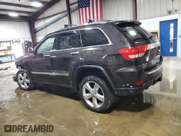 2013 Jeep Grand Cherokee Overland with VIN 1C4RJFCT7DC587329, listed as a Copart auction lot 53432625 with 98,938 mi miles and Salvage Title. Bid and sale history available at carsss.com. Image 2.