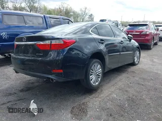 2013 Lexus ES 4dr Sdn with VIN JTHBK1GG5D2068945, listed as a IAAI auction lot 42027259 with 111,413 mi miles. Bid and sale history available at carsss.com. Image 4.