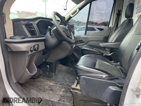 2020 Ford Transit Cargo with VIN 1FTBR1C89LKB74115, listed as a IAAI auction lot 42273395 with 105,768 mi miles and . Bid and sale history available at DreamBid. Image 12.