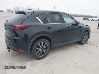 2017 Mazda CX-5 Grand Touring with VIN JM3KFADL9H0110985, listed as a IAAI auction lot 41435143 with 88,208 mi miles. Bid and sale history available at carsss.com. Image 4.