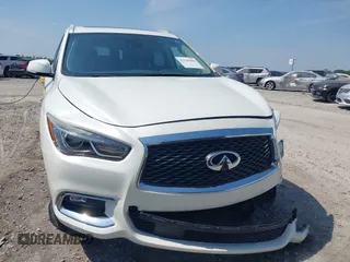 2019 Infiniti QX60 Luxe with VIN 5N1DL0MN7KC501009, listed as a IAAI auction lot 42145494 with 130,375 mi miles and . Bid and sale history available at DreamBid. Image 12.