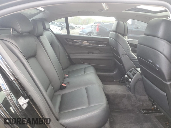2011 BMW 7 Series 740Li z VIN WBAKB4C5XBC574119, wystawiony jako Copart lot #54946445 z przebiegiem Nie podano mil oraz Szkoda całkowita • Salvage title. Historia ofert i sprzedaży dostępna na DreamBid. Obrazek 10.