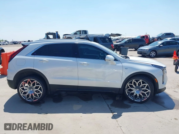 2024 Cadillac XT4 AWD Premium Luxury with VIN 1GYFZDR40RF100102, listed as a IAAI auction lot 41987175 with 4,935 mi miles and . Bid and sale history available at DreamBid. Image 13.