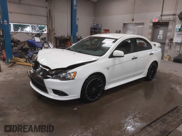 2014 Mitsubishi Lancer GT with VIN JA32U8FWXEU016230, listed as a IAAI auction lot 41379899 with 108,511 mi miles. Bid and sale history available at carsss.com. Image 2.