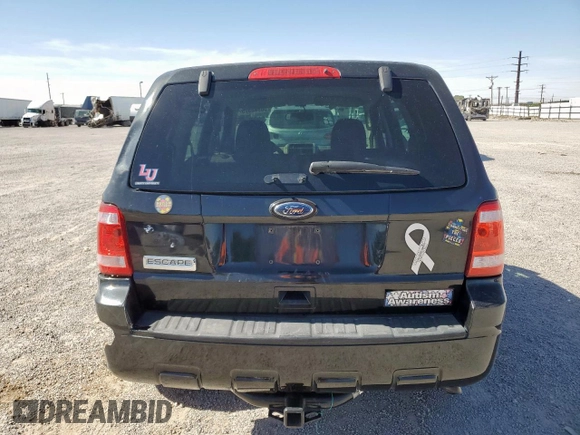 2011 Ford Escape XLS with VIN 1FMCU0C79BKC04115, listed as a Copart auction lot 56982375 with 193,078 mi miles and Salvage title. Bid and sale history available at DreamBid. Image 6.