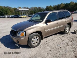 2002 GMC Envoy SLT with VIN 1GKDT13S022456264, listed as a Copart auction lot 76556004 with 230,954 mi miles and Salvage Title. Bid and sale history available at DreamBid. Image 1.