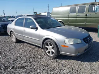 2001 Nissan Maxima GLE z VIN JN1CA31A41T304048, wystawiony jako IAAI lot #42170749 z przebiegiem 215 284 mil mil oraz . Historia ofert i sprzedaży dostępna na DreamBid. Obrazek 1.