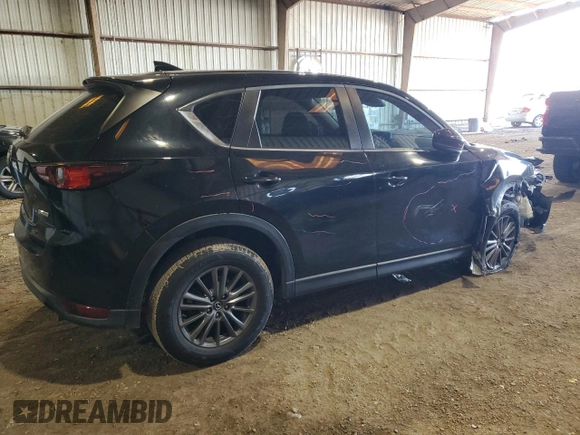2017 Mazda CX-5 Sport with VIN JM3KFABL9H0210264, listed as a Copart auction lot 87918795 with 129,827 mi miles and Salvage Title. Bid and sale history available at carsss.com. Image 3.