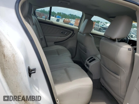 2010 Ford Taurus Limited with VIN 1FAHP2FW8AG162978, listed as a Copart auction lot 57617625 with 228,621 mi miles and Salvage title. Bid and sale history available at DreamBid. Image 10.