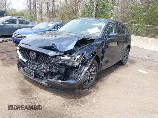 2018 Mazda CX-5 Grand Touring with VIN JM3KFBDM3J0377866, listed as a IAAI auction lot 41947014 with 70,446 mi miles. Bid and sale history available at carsss.com. Image 2.