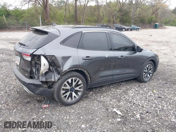 2020 Ford Escape SE Sport Hybrid with VIN 1FMCU0BZ7LUB13398, listed as a IAAI auction lot 41942498 with 118,604 mi miles and . Bid and sale history available at DreamBid. Image 4.