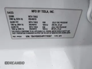 2023 Tesla Model Y Long Range with VIN 7SAYGDEE4PF770307, listed as a IAAI auction lot 42141175 with 34,901 mi miles and . Bid and sale history available at carsss.com. Image 9.