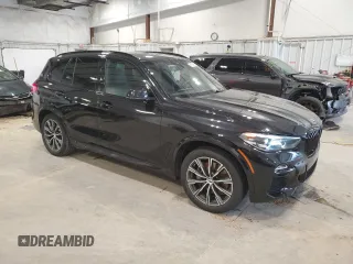2021 BMW X5 xDrive45e with VIN 5UXTA6C02M9F45757, listed as a Copart auction lot 61991985 with 65,162 mi miles and Salvage title. Bid and sale history available at DreamBid. Image 4.
