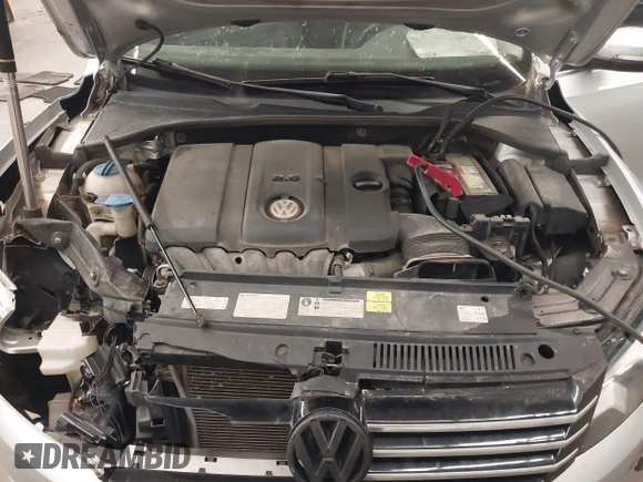 2013 Volkswagen Passat SE with VIN 1VWBH7A39DC145297, listed as a IAAI auction lot 42048991 with 146,897 mi miles and . Bid and sale history available at DreamBid. Image 10.