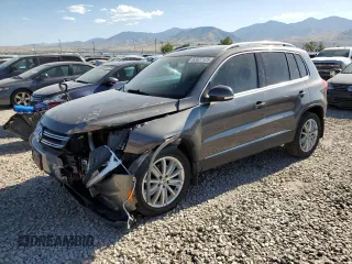 2015 Volkswagen Tiguan SE with VIN WVGBV7AX9FW552659, listed as a Copart auction lot 63627125 with 158,940 mi miles and Salvage title. Bid and sale history available at DreamBid. Image 1.
