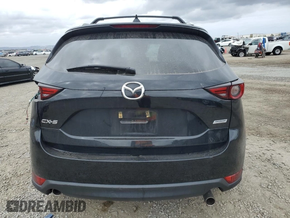 2018 Mazda CX-5 Grand Touring with VIN JM3KFADM3J1370114, listed as a Copart auction lot 54579585 with 65,513 mi miles and Salvage Title. Bid and sale history available at DreamBid. Image 6.